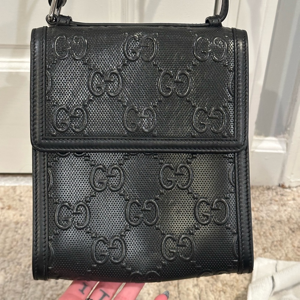 Gucci Embossed Leather crossbody bag with magnetic clasp closure